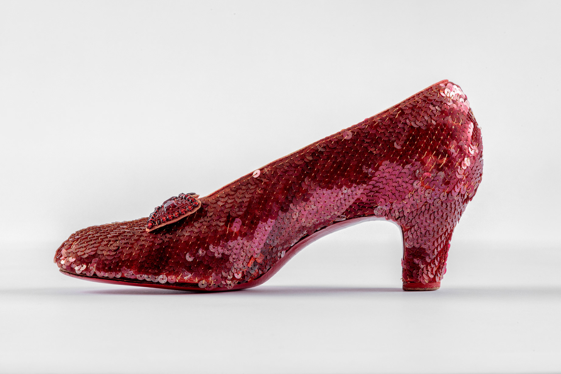 Screen-used close-up pair of the Ruby Slippers, designed by Adrian, from "The Wizard of Oz" (1939). Academy Museum of Motion Pictures. Photo by Joshua White, JWPictures/©Academy Museum Foundation