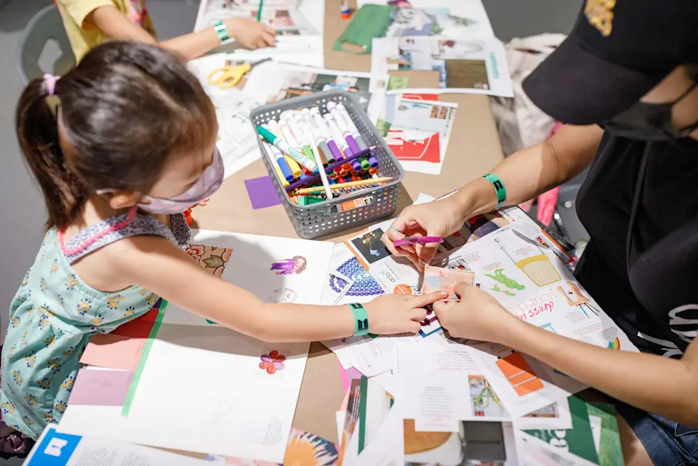 Children at art table in Shirley Temple Education Studio