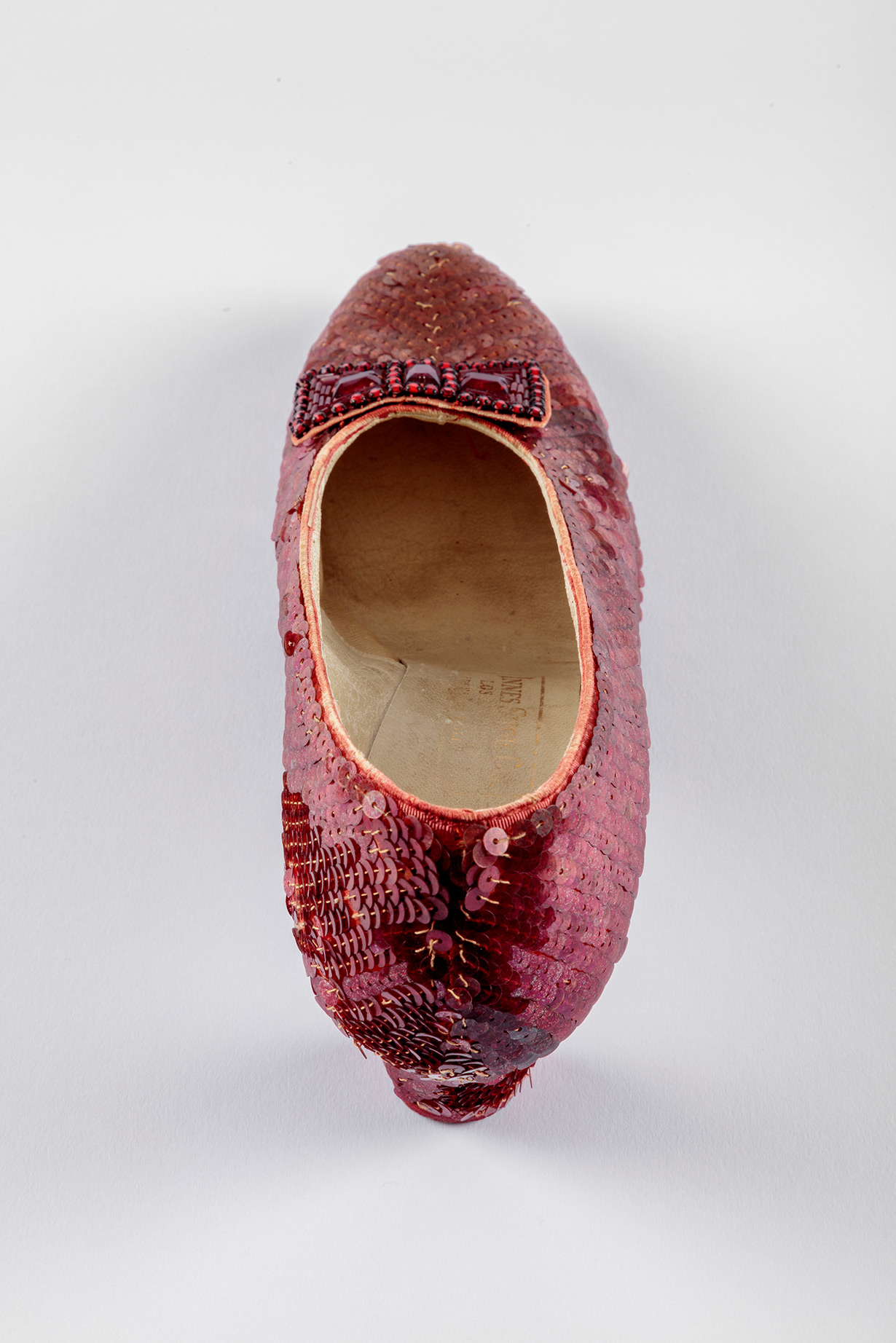 Screen-used close-up pair of the Ruby Slippers, designed by Adrian, from "The Wizard of Oz" (1939). Academy Museum of Motion Pictures. Photo by Joshua White, JWPictures/©Academy Museum Foundation