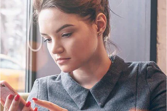 Woman looking at a mobile phone