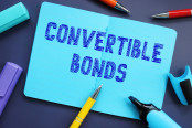 Financial concept meaning convertible bonds with inscription on the sheet.