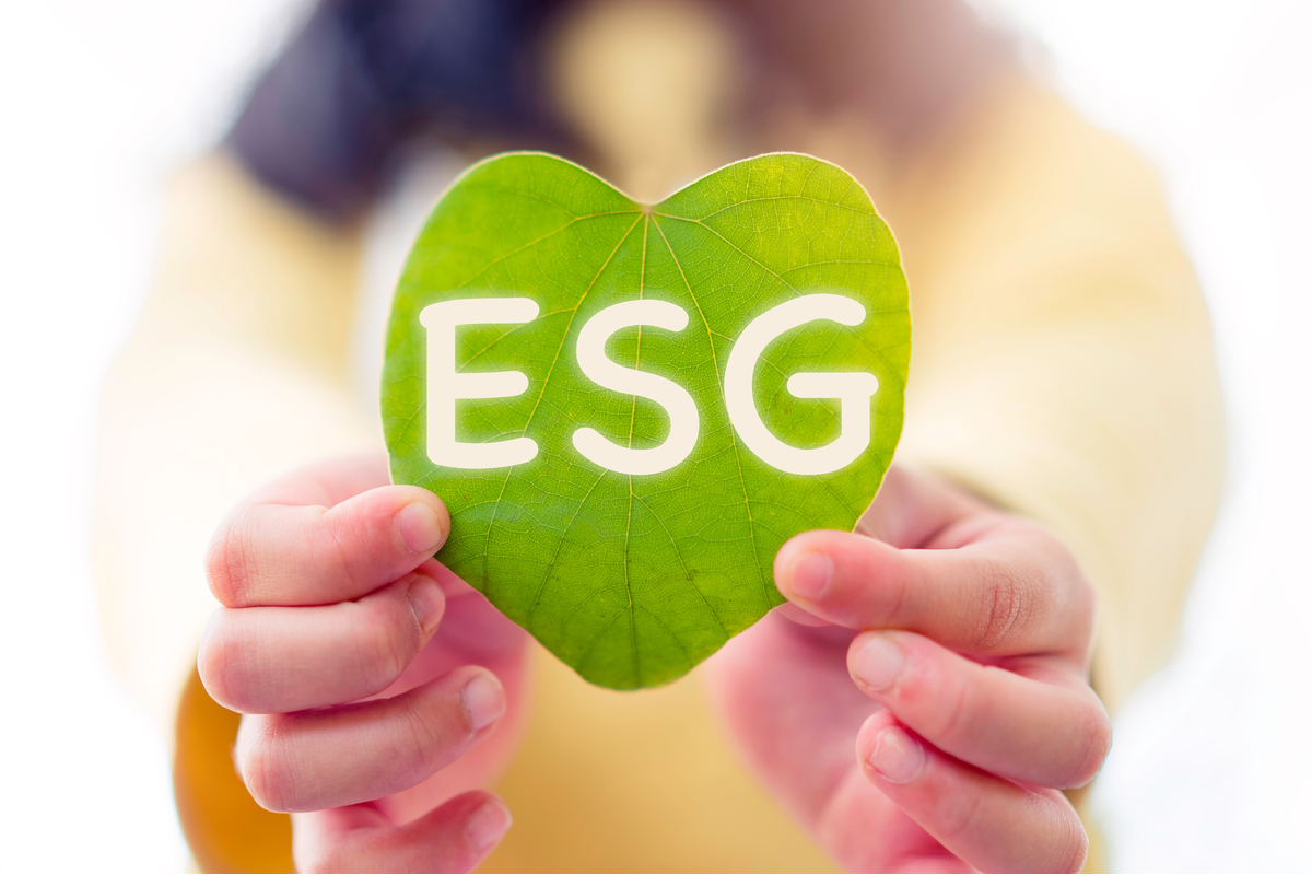 ESG text symbol on kid hands