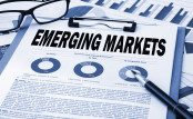 emerging markets analysis concept on clipboard