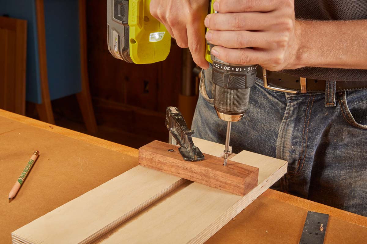 drilling pilot holes and screw on a cleat to the plywood