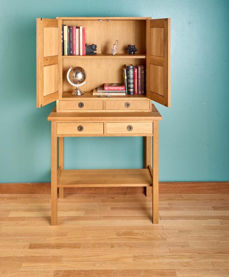 library chest/cabinet on stand with door open to show globe, books, knick knacks