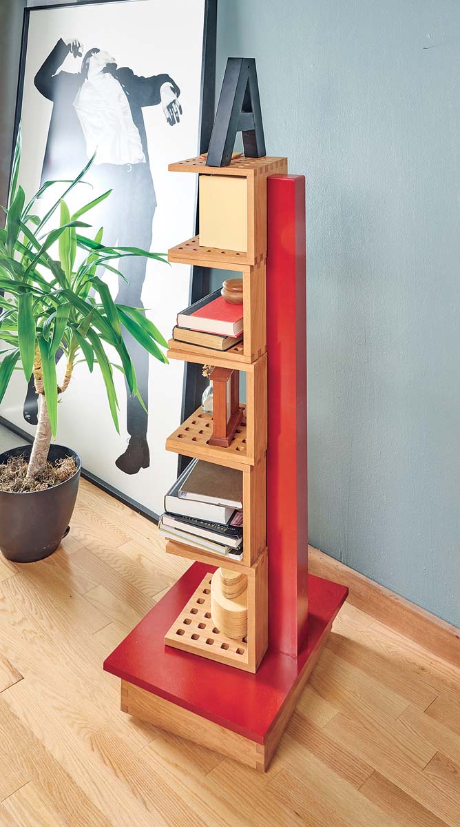 red MDF painted finish covered the tower holding all the individual book shelves