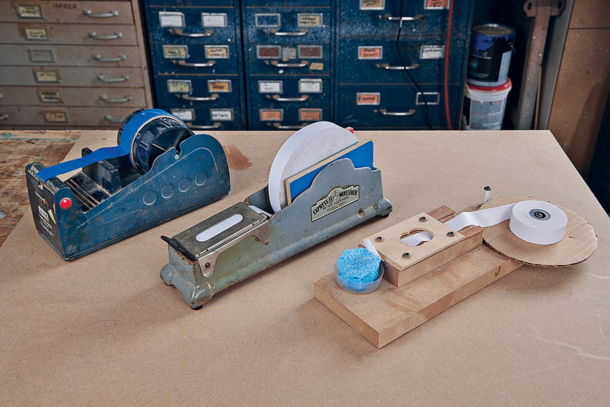 3 weighted tape dispeners one wood two metal