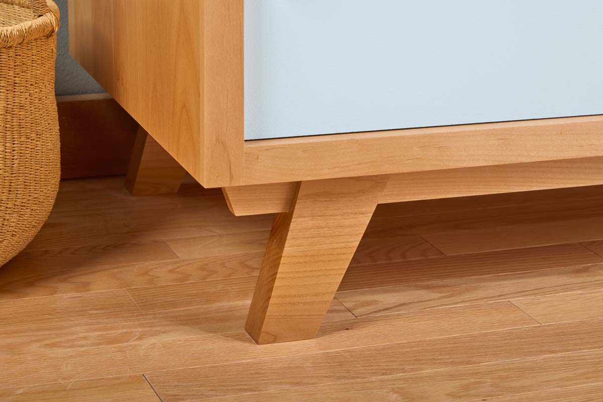 slanted legs of cabinet