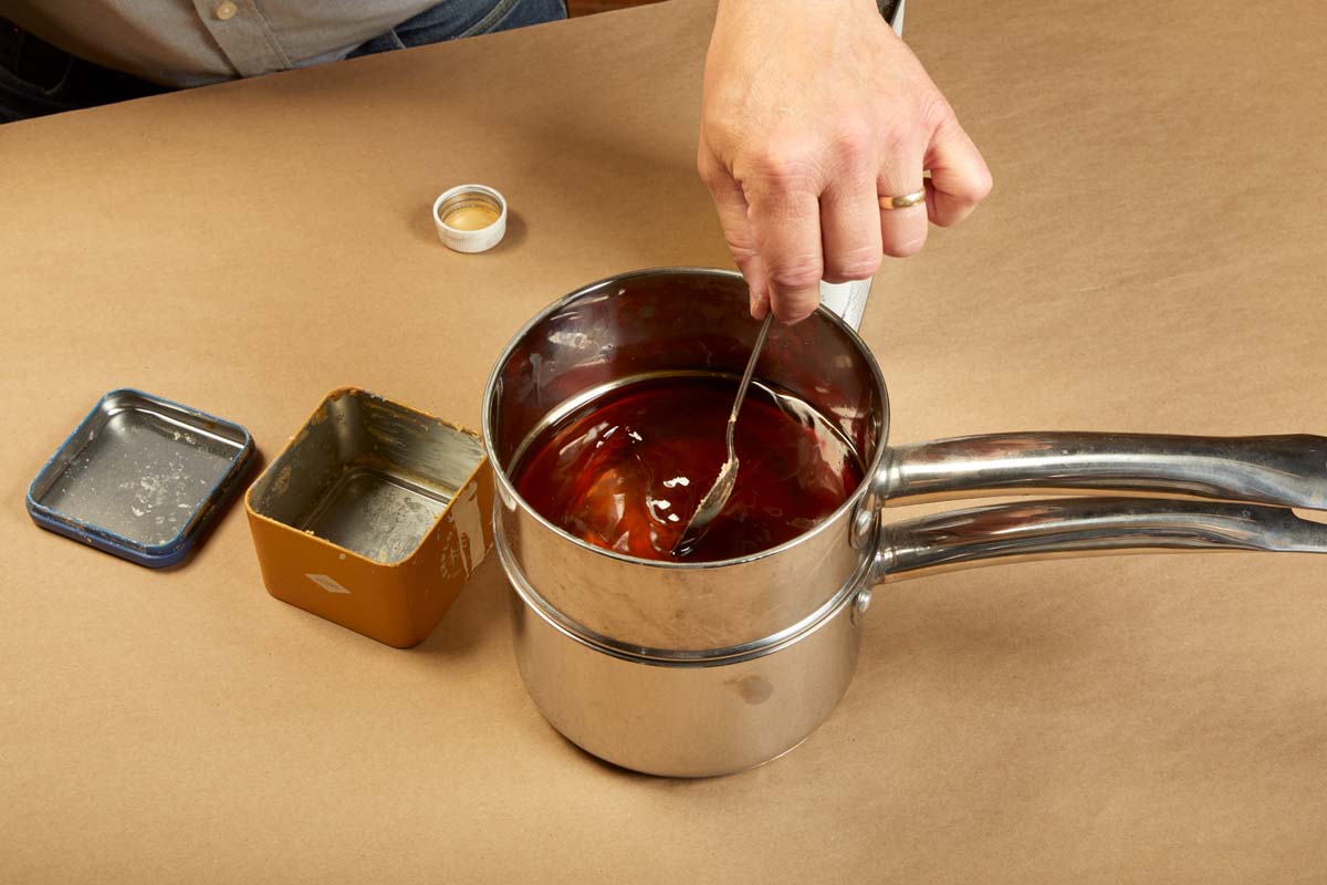 stirring wax and solvent mix together
