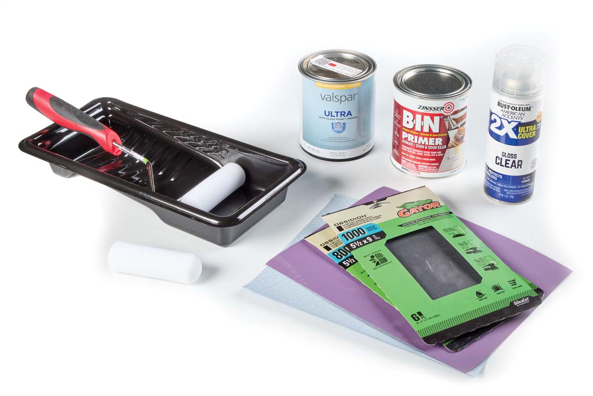 finishing supplies, including paint roller, primer, gloss finish, valspar ultra gloss primer, sanding paper
