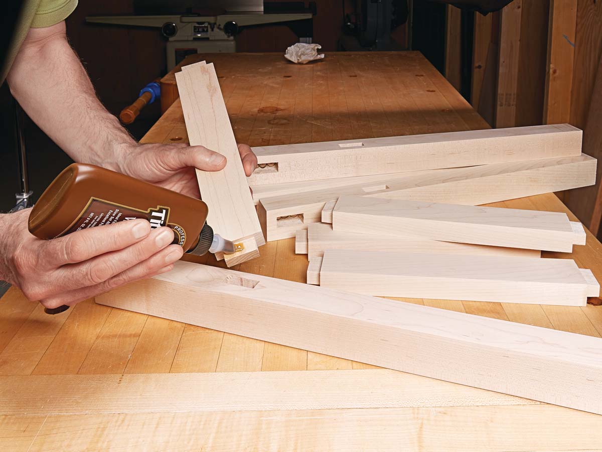 titebond liquid hide glue being used in peg joinery