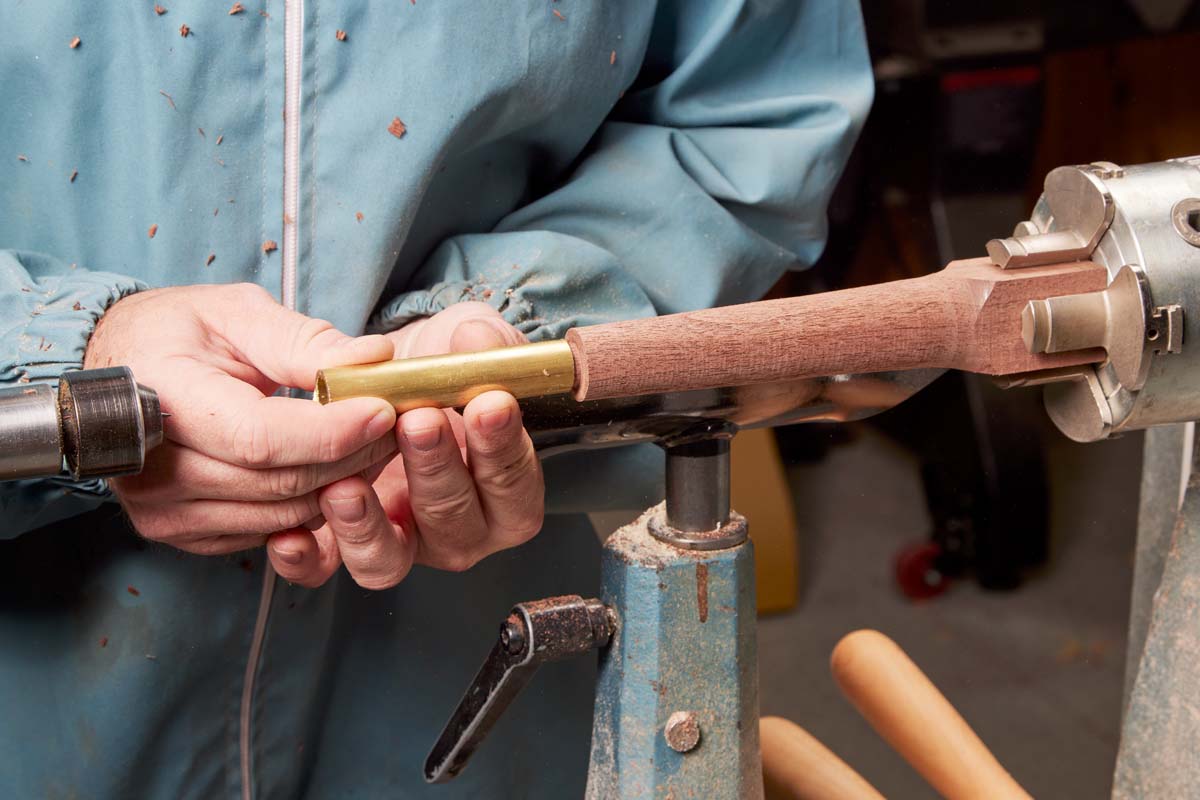 shaping marking knife on laithe figure 2, shows to test the fit of the tube