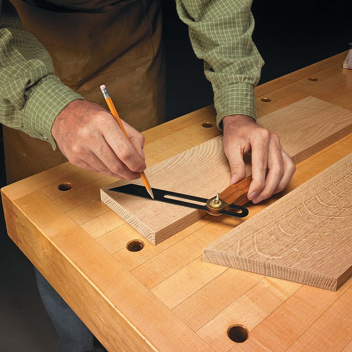 Using sliding bevel gauge to make pencil marks on wood workpiece