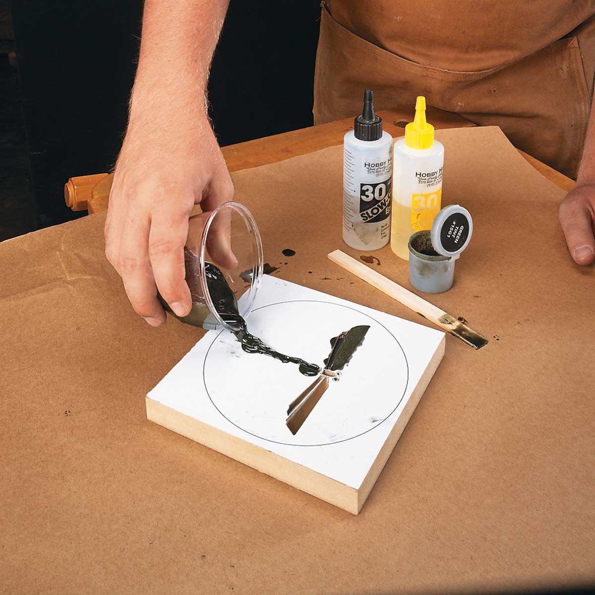 Pouring resin solution inside wood