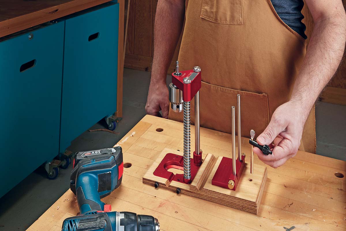 image shows holes on the step offer storage. Here one holds the key and two hold the guide rods 