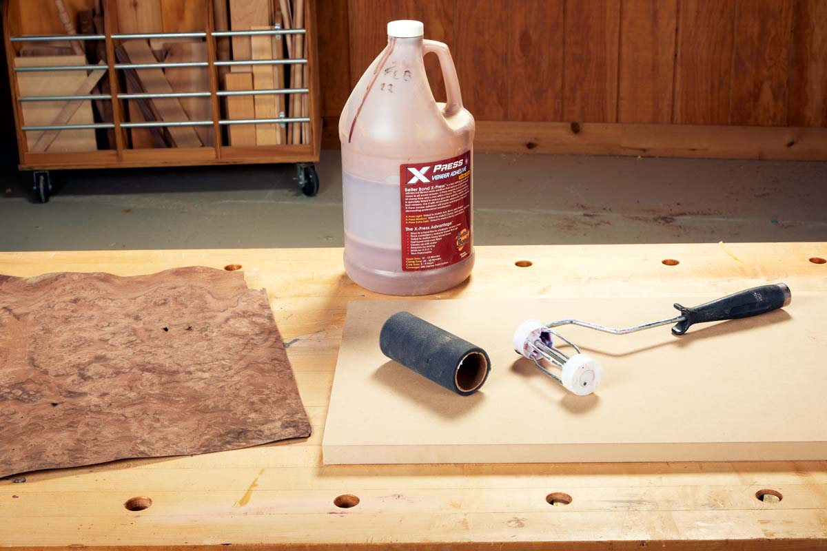 foam roller and roller cage with gallon of better bond X press veneer adhesive