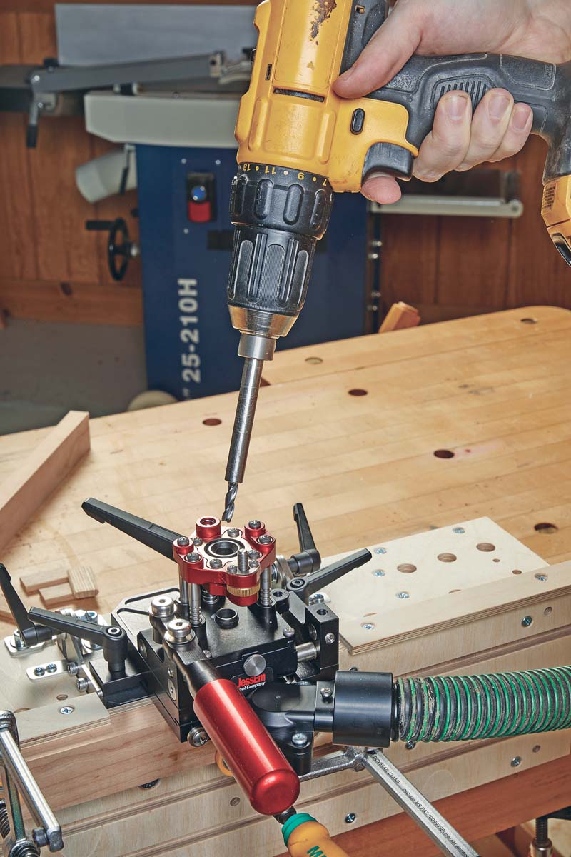 adding bit into drill guide
