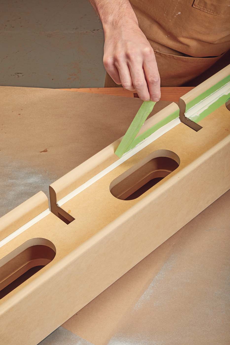 Removing the tape during the curing process to ensure a crisp, clean line