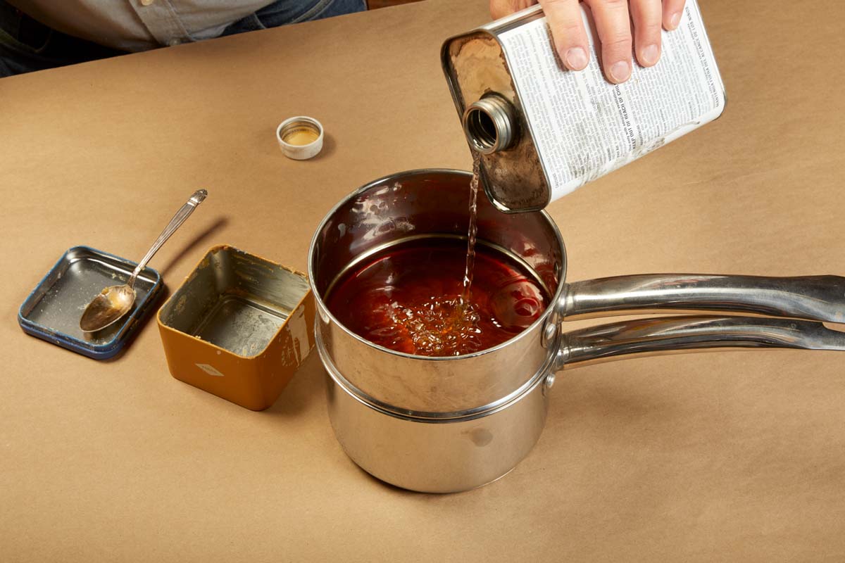 adding solvent to melted wax