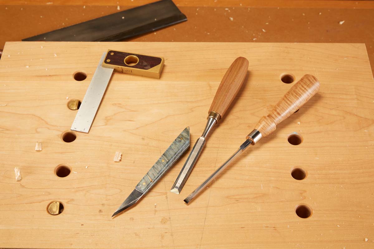 knife and pair of chisels