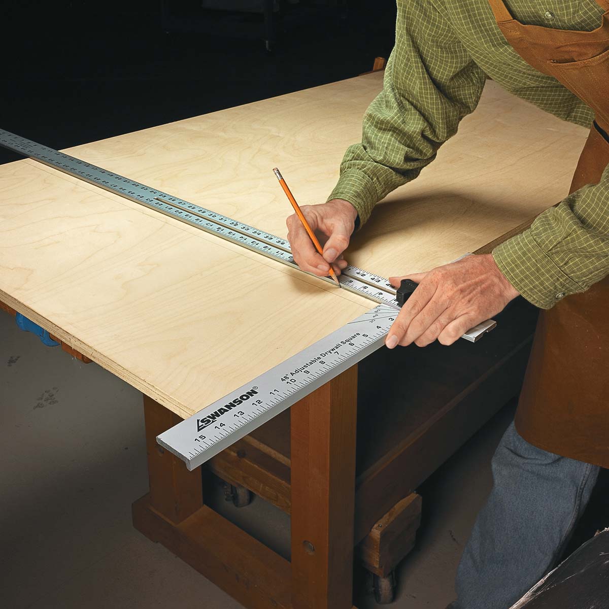 Using framing square to measure large wood board