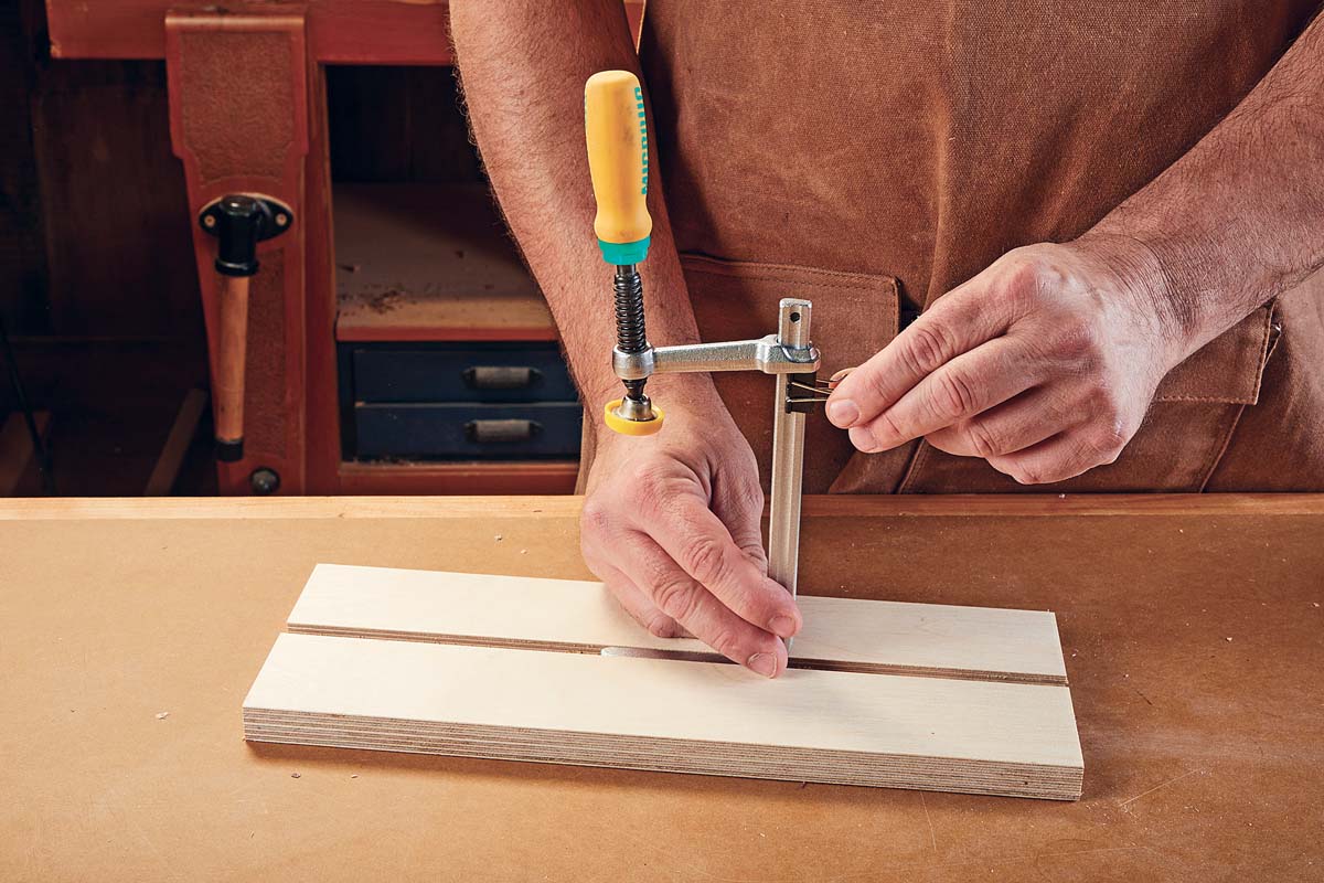 adding binder clip to bar of dovetail clamp