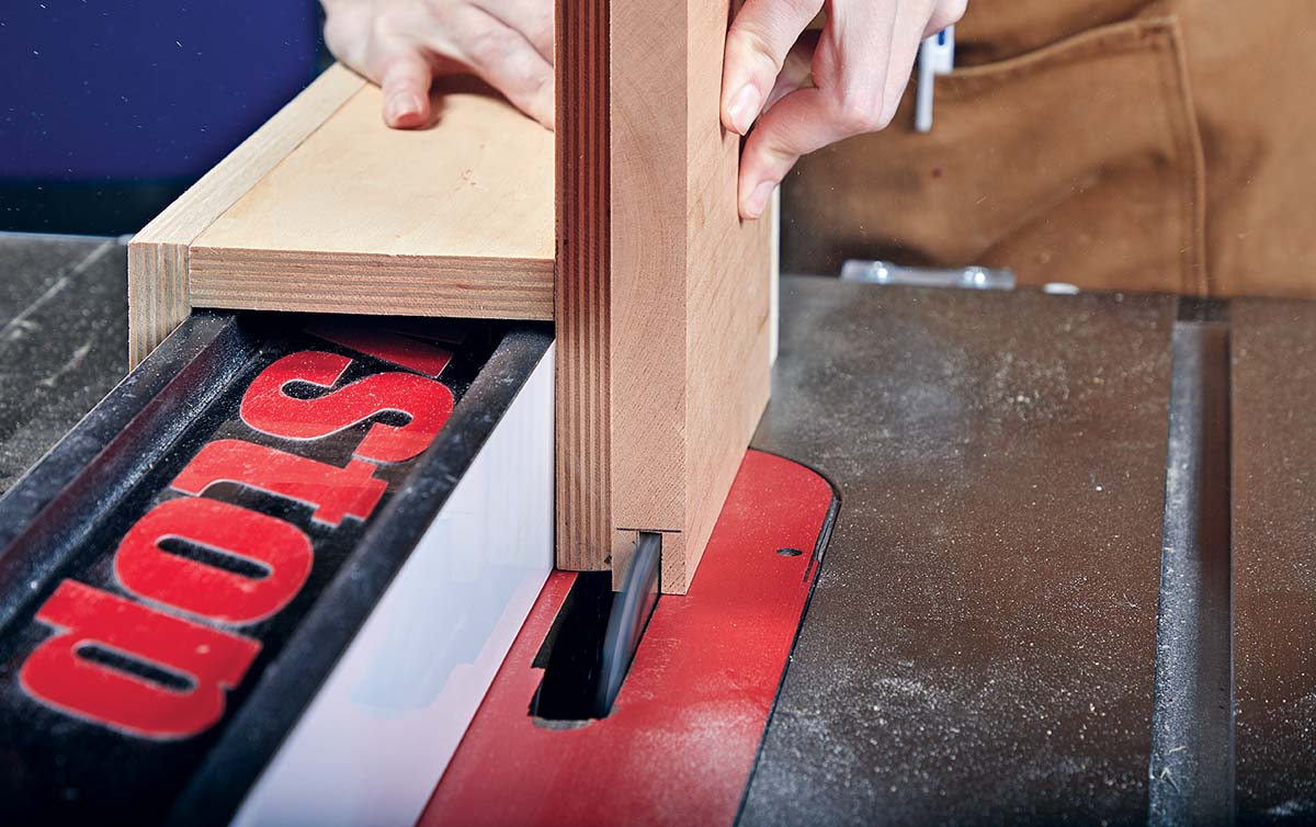 cutting an edge groove on a table saw with plywood jig