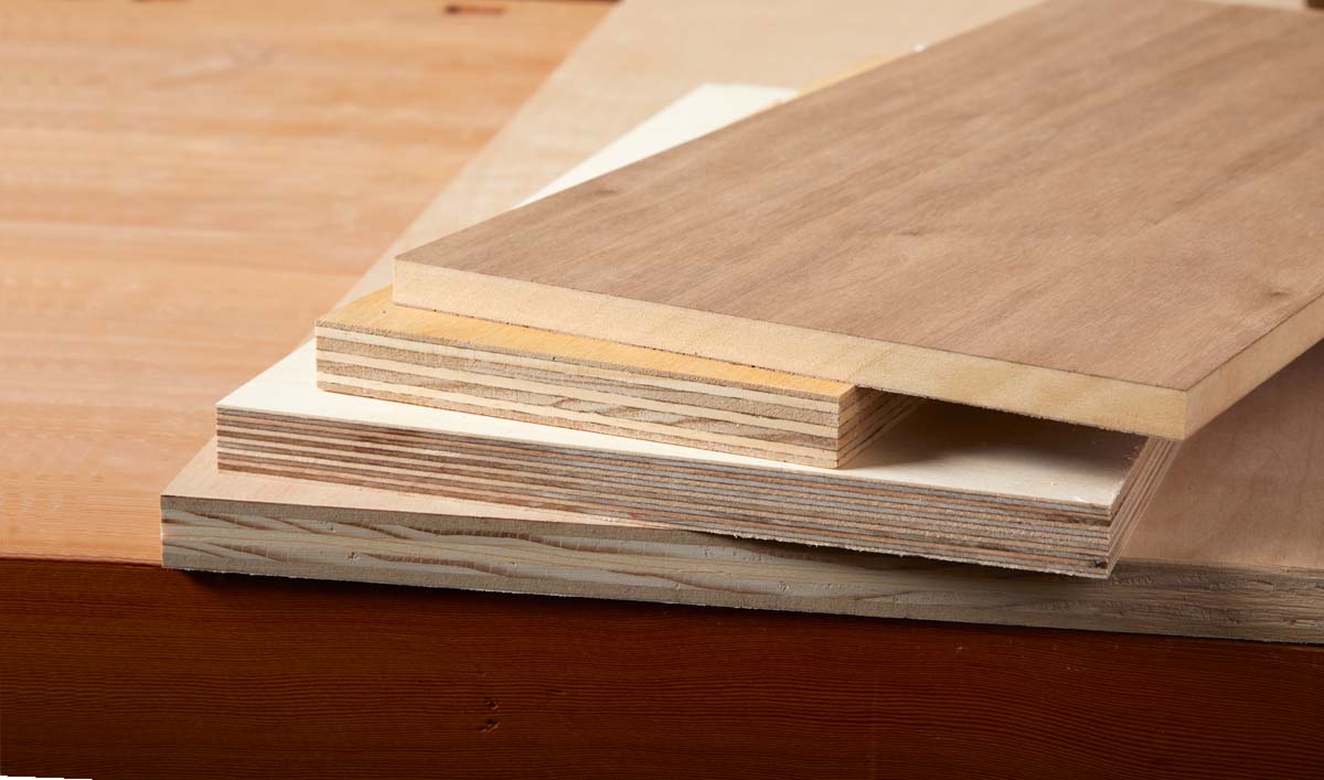 stack of various plywood including MDF core, domestic, baltic birch, and composite plywoods