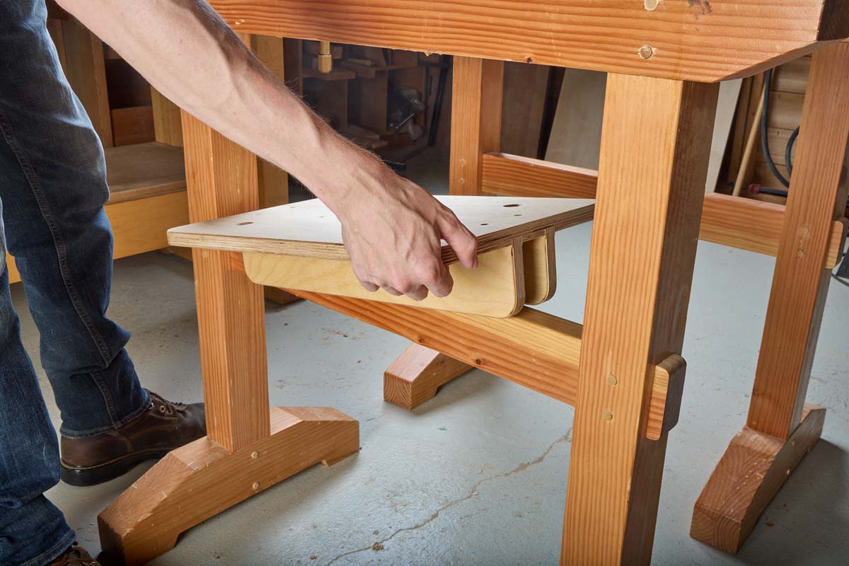 placing diy shelf onto sawhorse