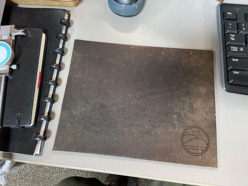 Leather mouse pad with laser engraved logo