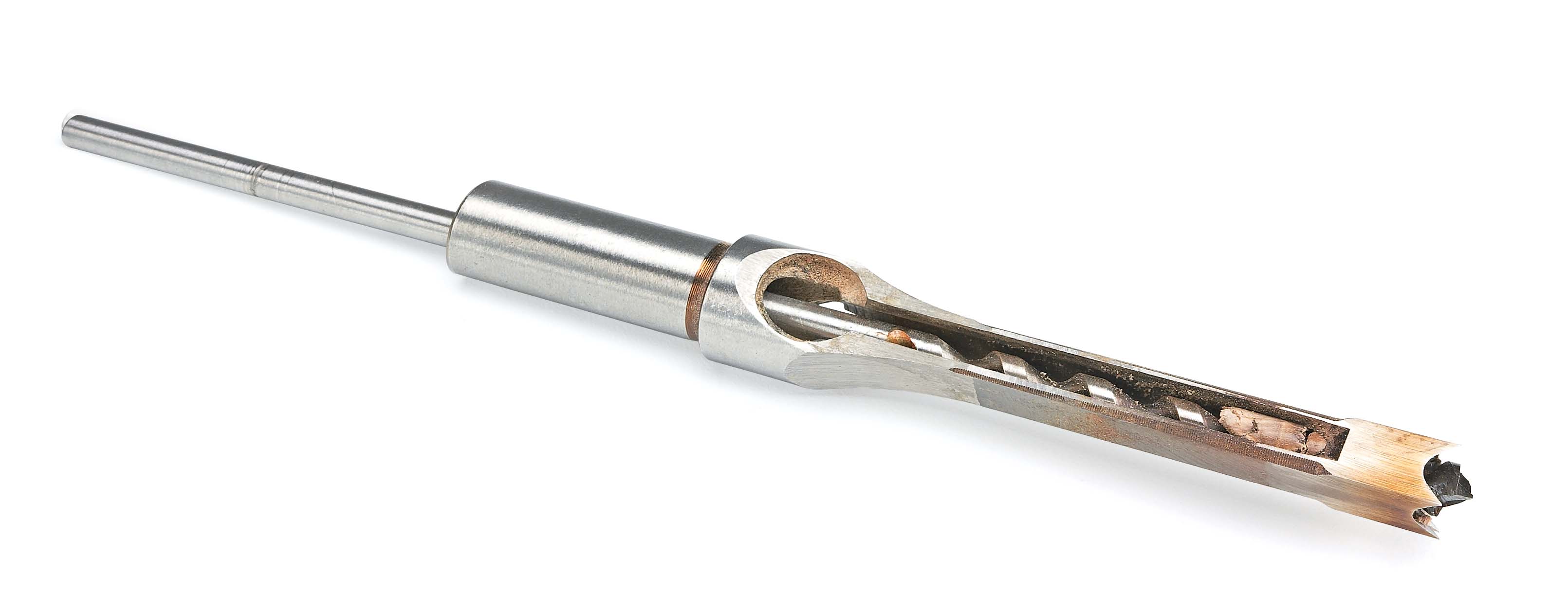 Hollow chisel packed with wood chips