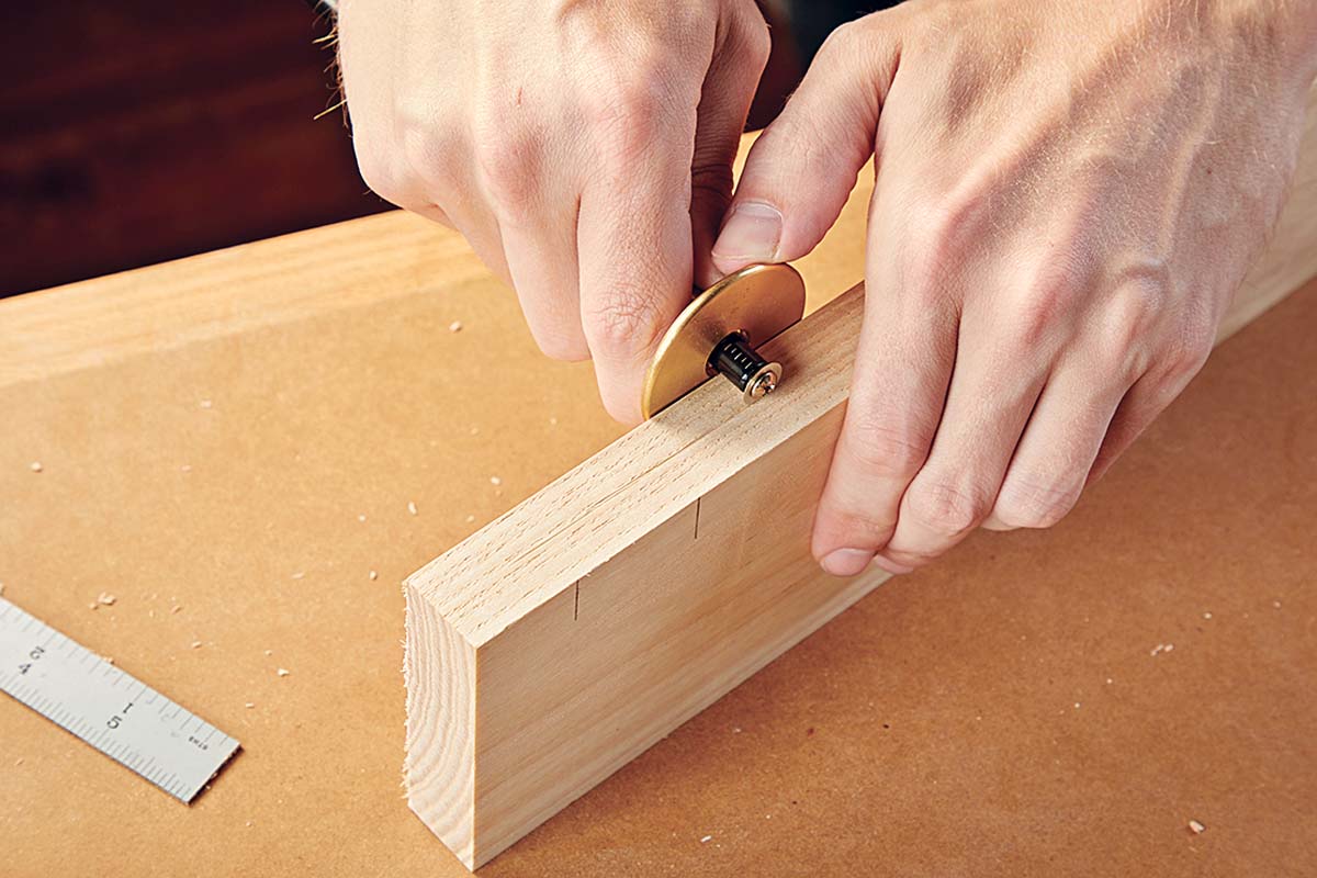 scoring centerline of wood piece on the edge