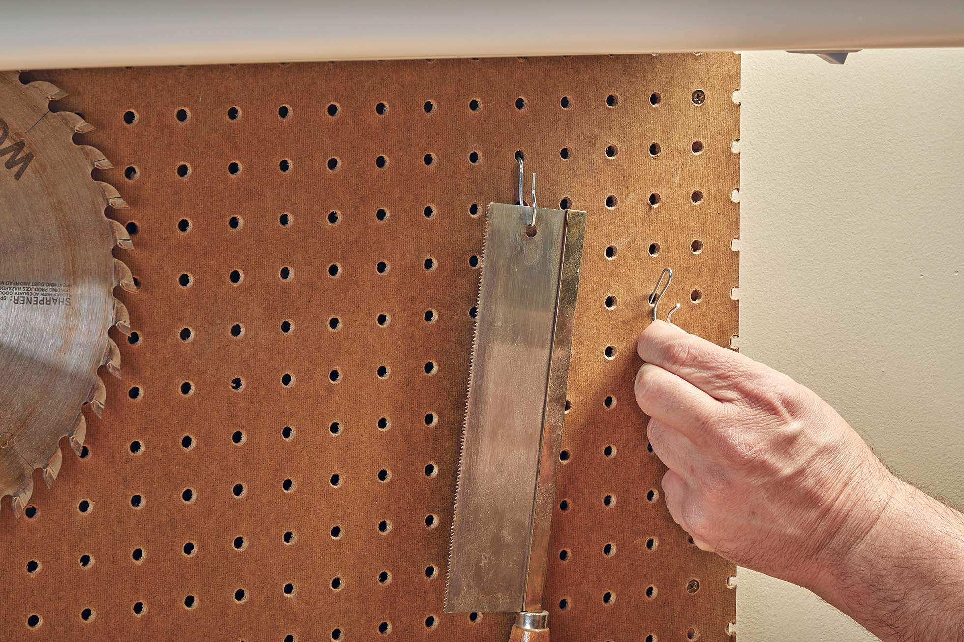 drapery hooks being used as pegboard hooks