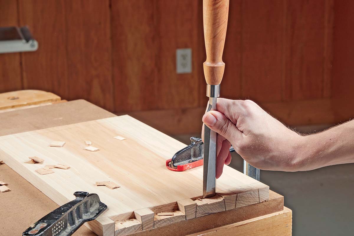 cutting where dovetails are marked with chisel