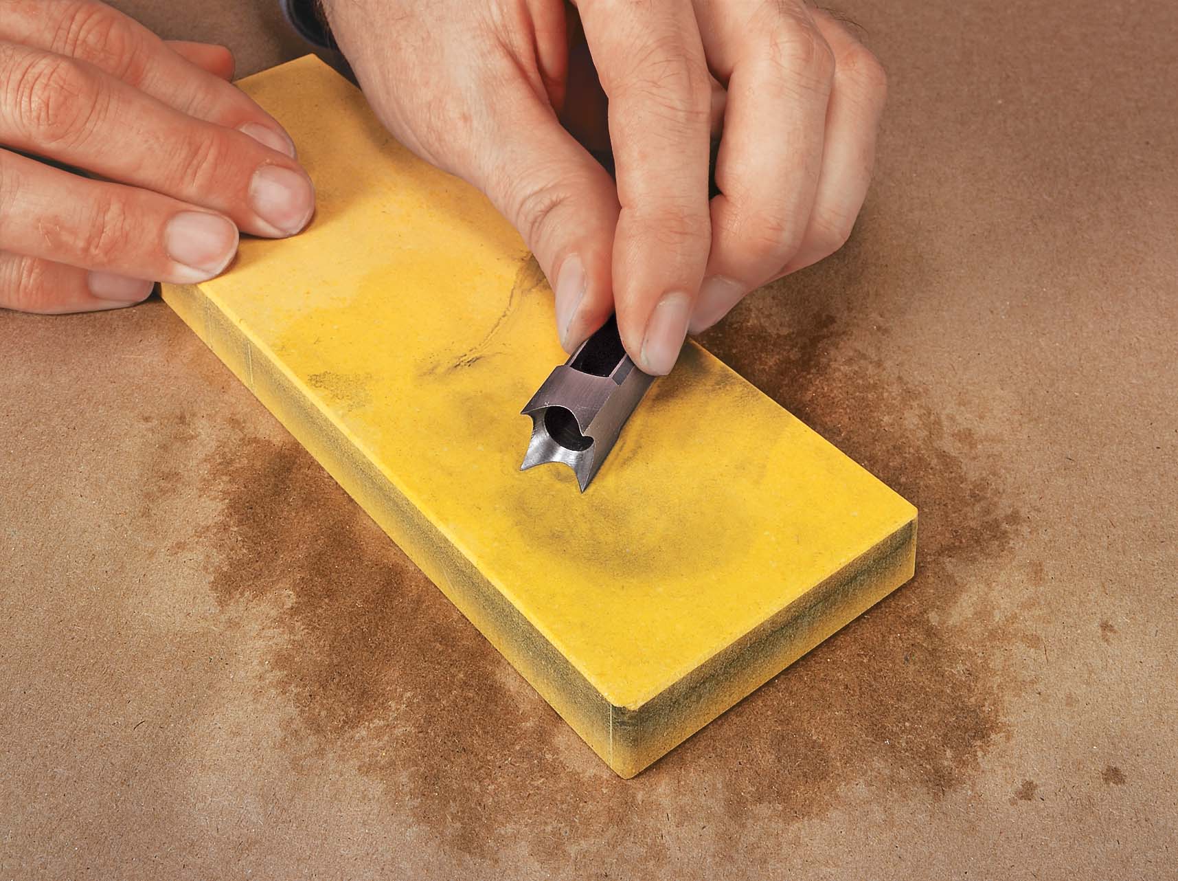 Honing the 4 faces of the hollow chisel with a waterstone