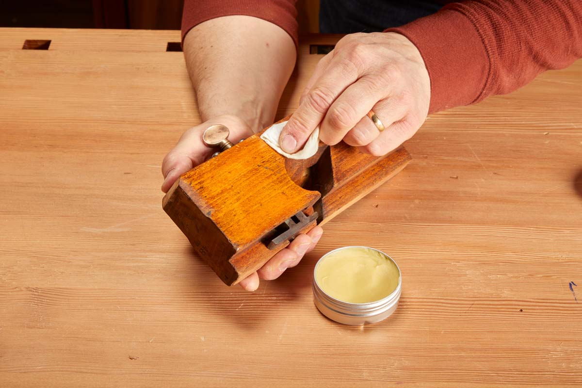 waxing the wood for dado plane