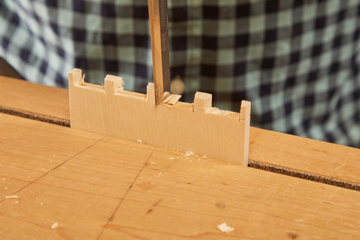 using chisel and knife to remove more excess