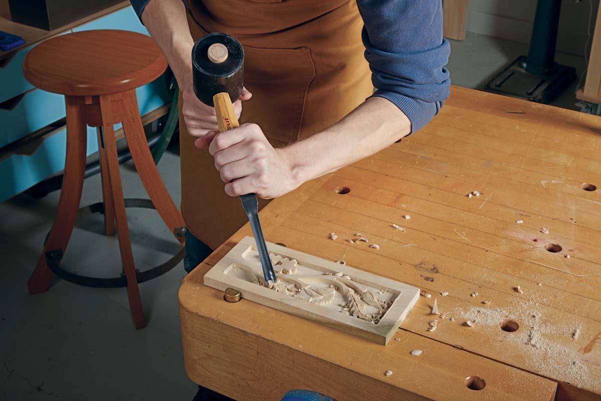 using flexcut half gouge to carve rolling surface