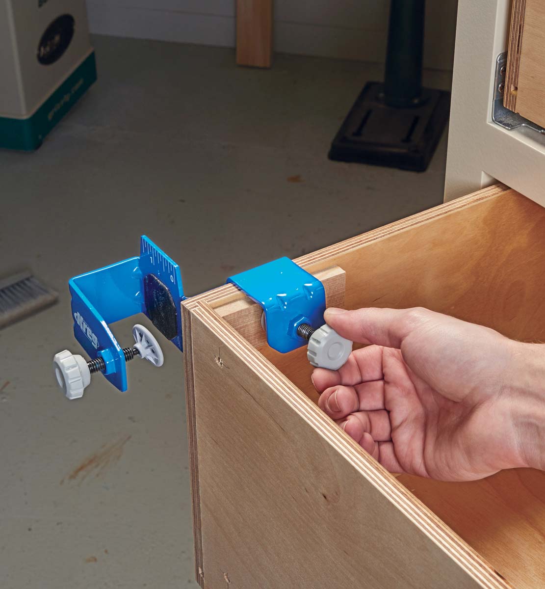 using inner clamp to secure side of drawer