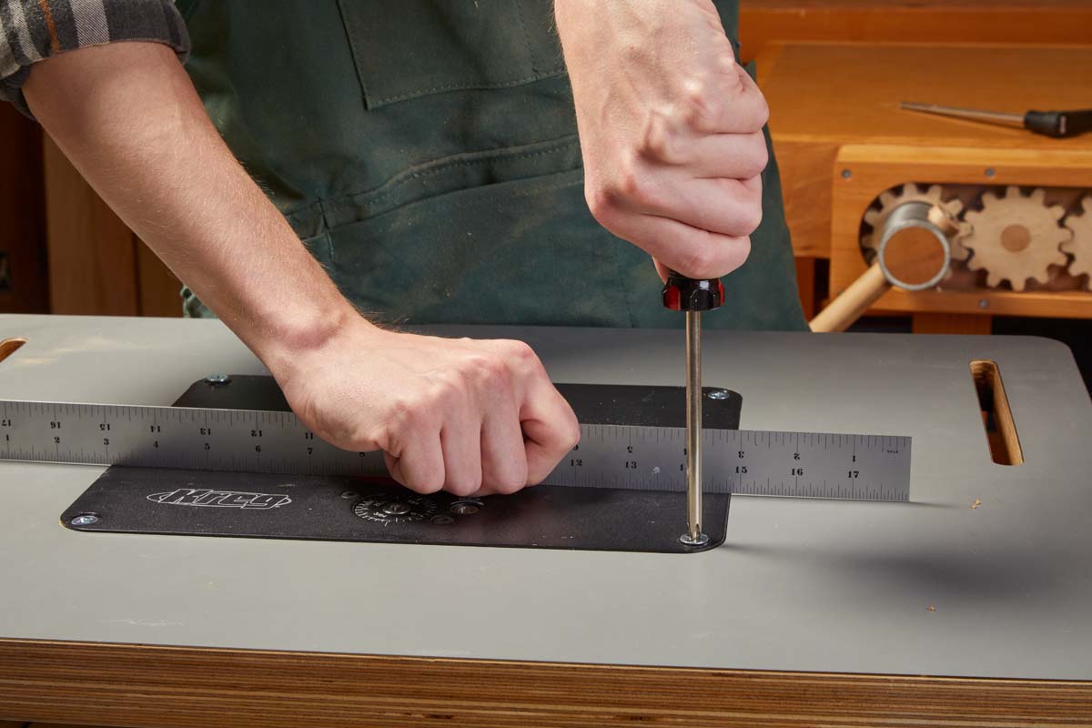 using ruler as straight edge while using screwdriver