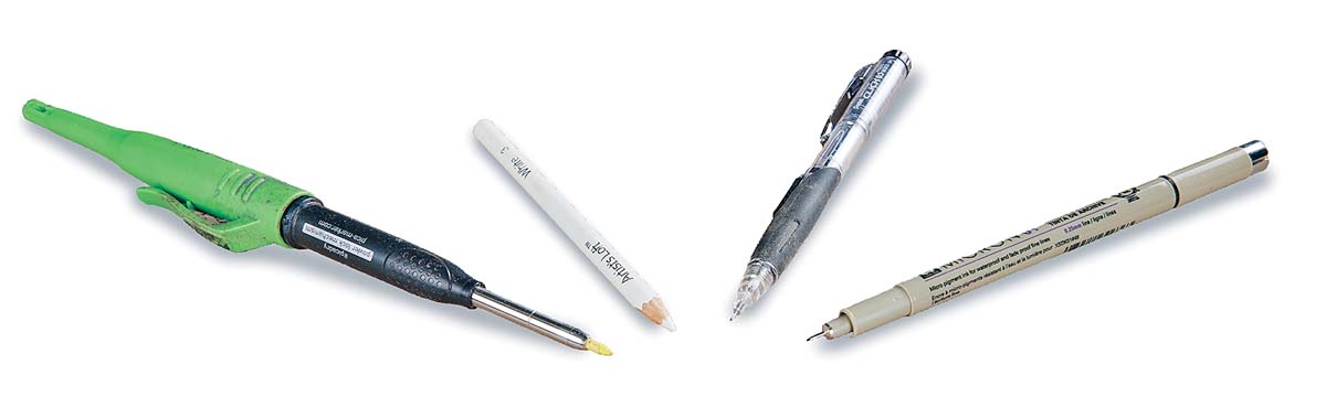 yellow lead in green pencil holder, white colored pencil, mechanical pencil, fine tipped marker