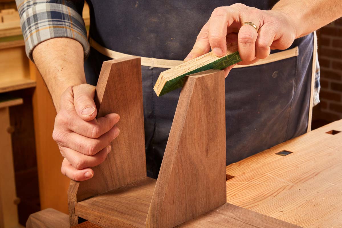 diy sandpaper block being used for edges with a chamfer