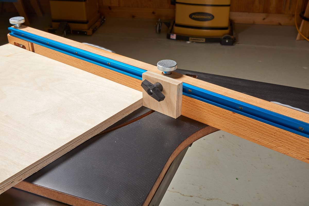 T-track on cut off sled for stop and hold downs