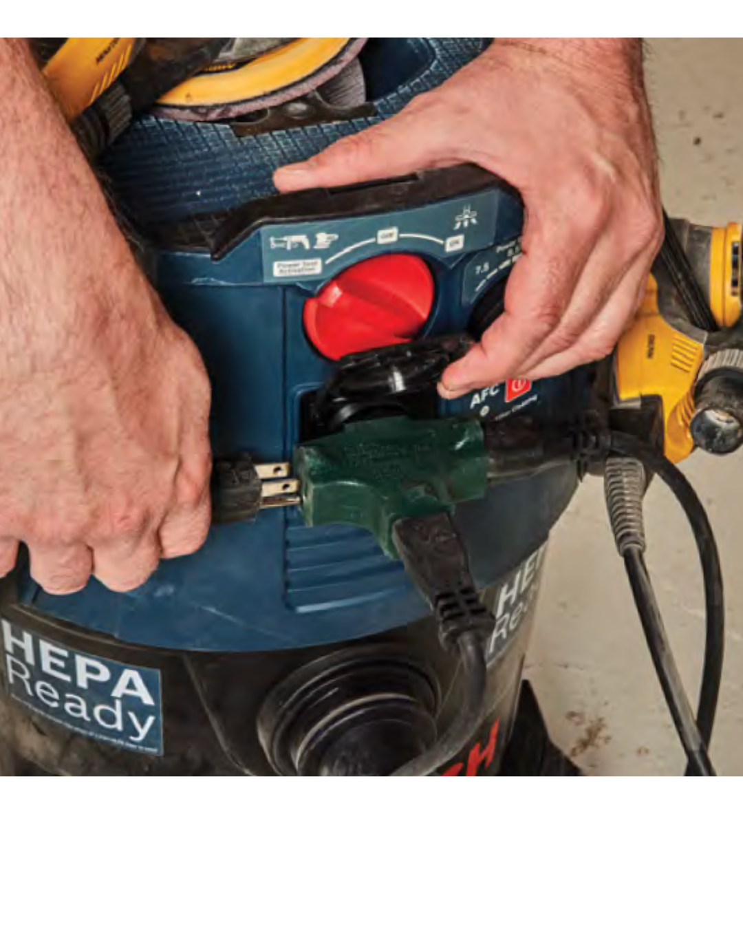 image shows using splinter attached to automated vacuum to attach both a 5" sander and detail sander for dust collection