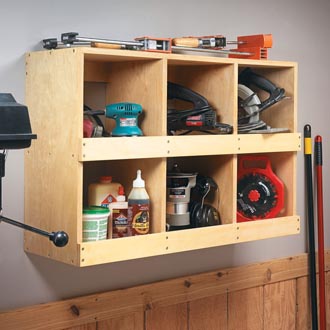 Simple rack holds all your vacuum accessories.
