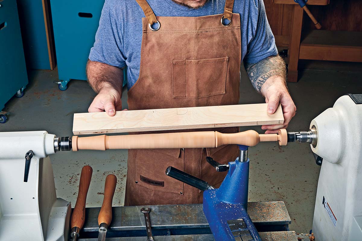 clipped nails on board to grind against lathe
