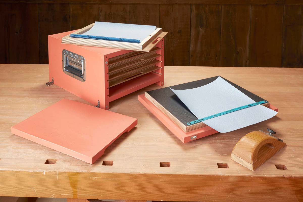 image of sanding block tote with custom hack saw blade for cutting