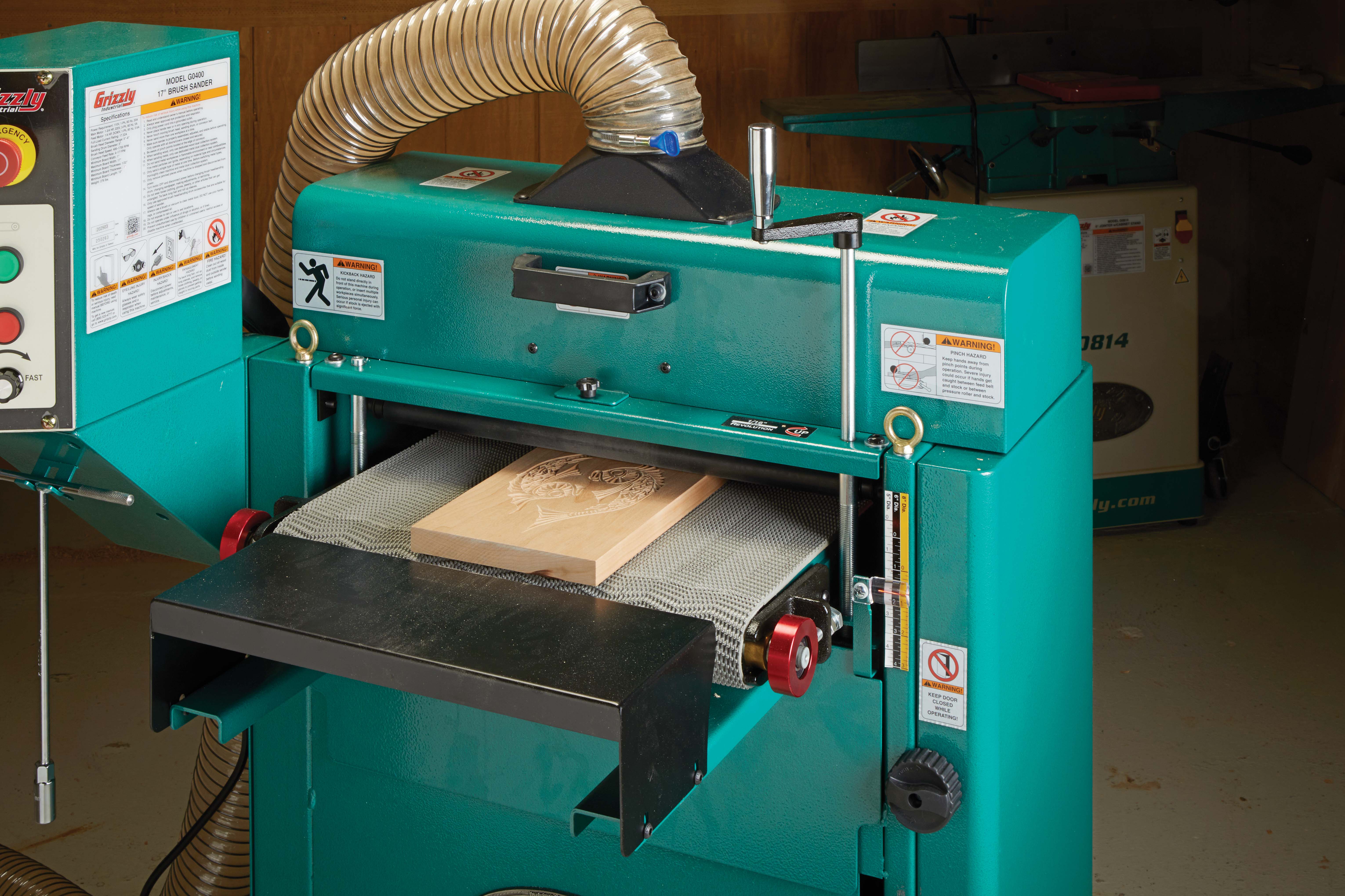 Image showing CNC carving going into RIZZLY BRUSH SANDER