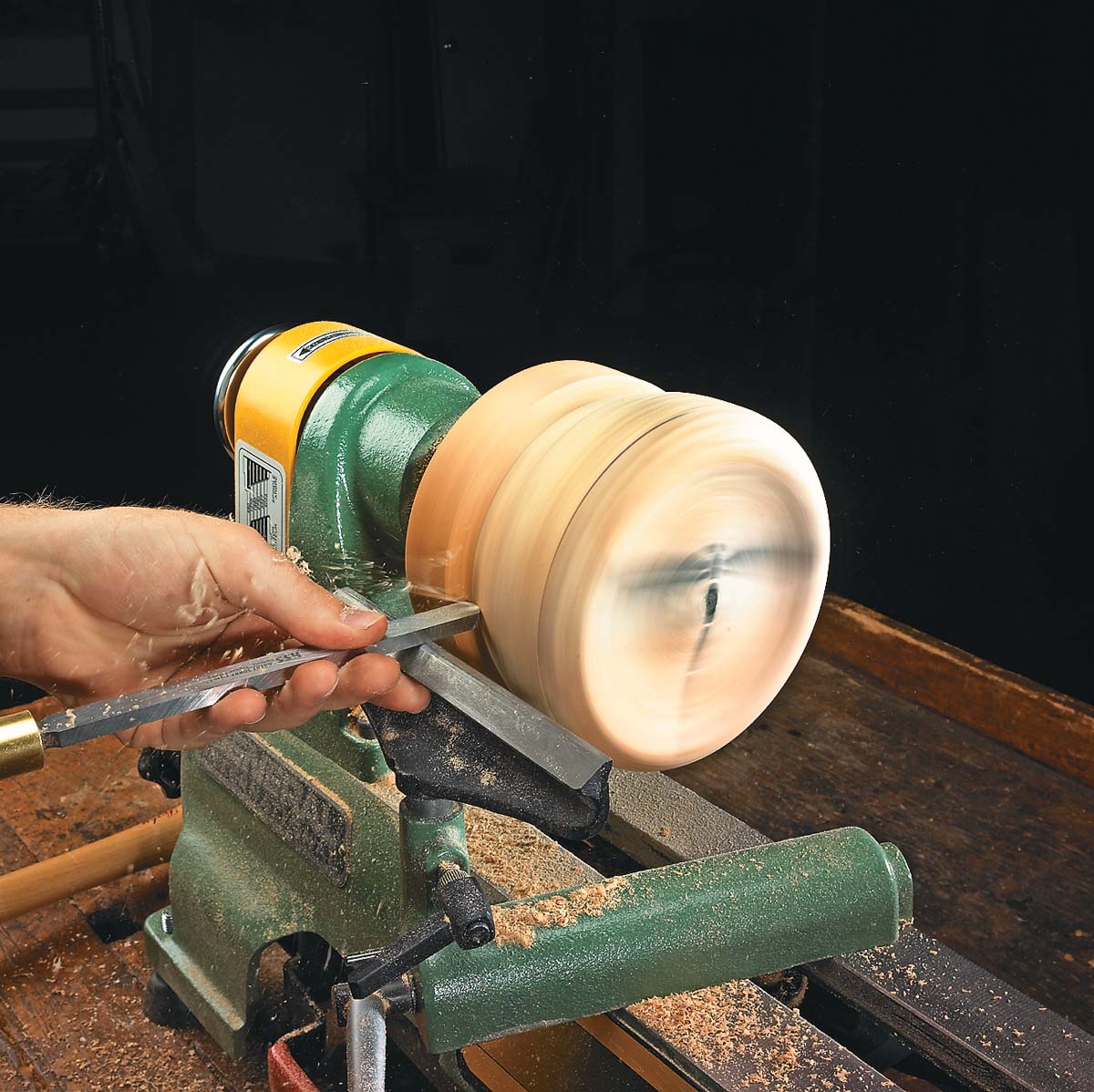 turning side of box with round-nose scrapper