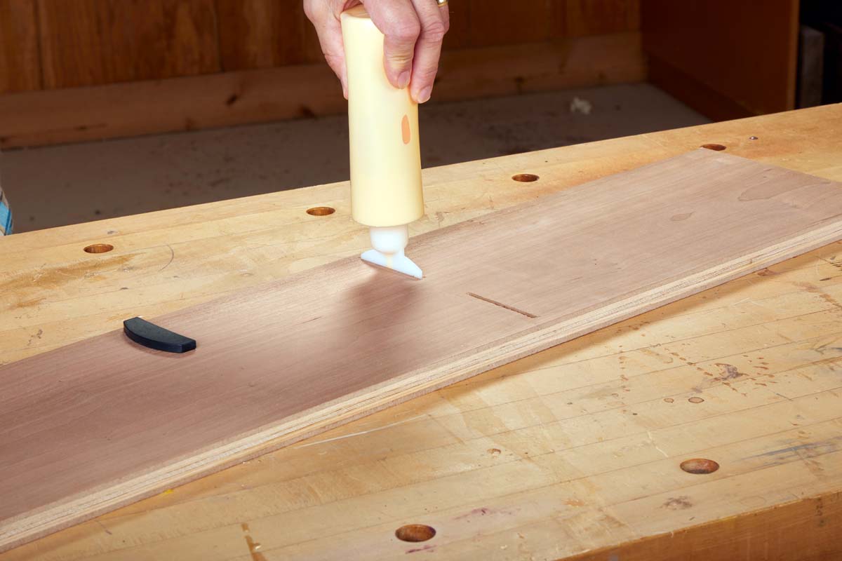 glue spreader nozzle fit into biscuit slot